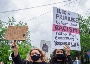 People marching with signs